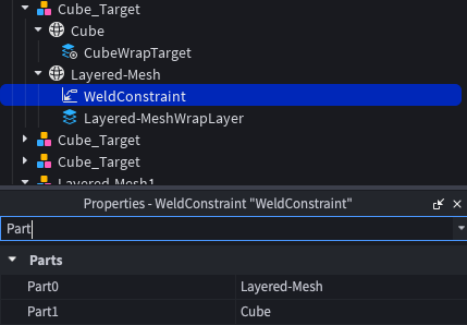 The WeldConstraint properties with Part0 set to the layered mesh and Part1 set to the target.