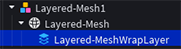 The Studio Explorer showing a MeshPart with a child WrapLayer object.