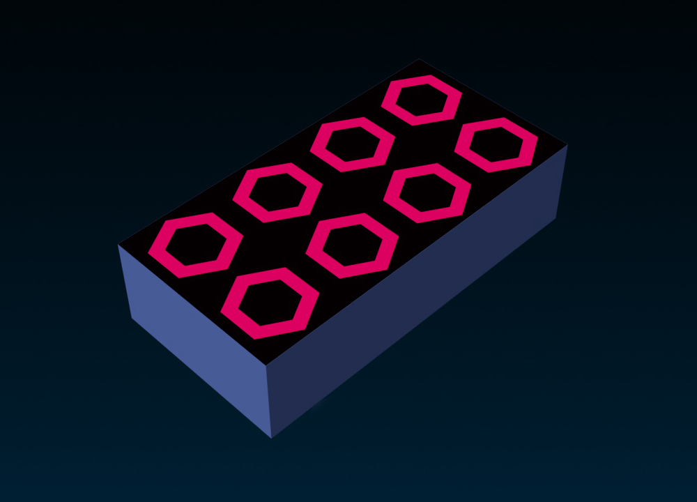 The same block part with a repeating hexagon texture on its top face, but the hexagons are pink against on dark purple background.