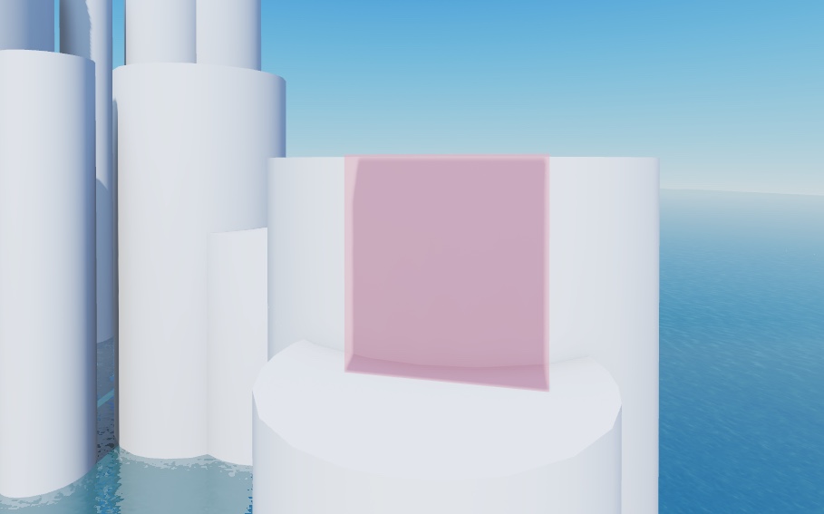 A close-up view of a partially translucent pink block sticking out of a gray cylinder.