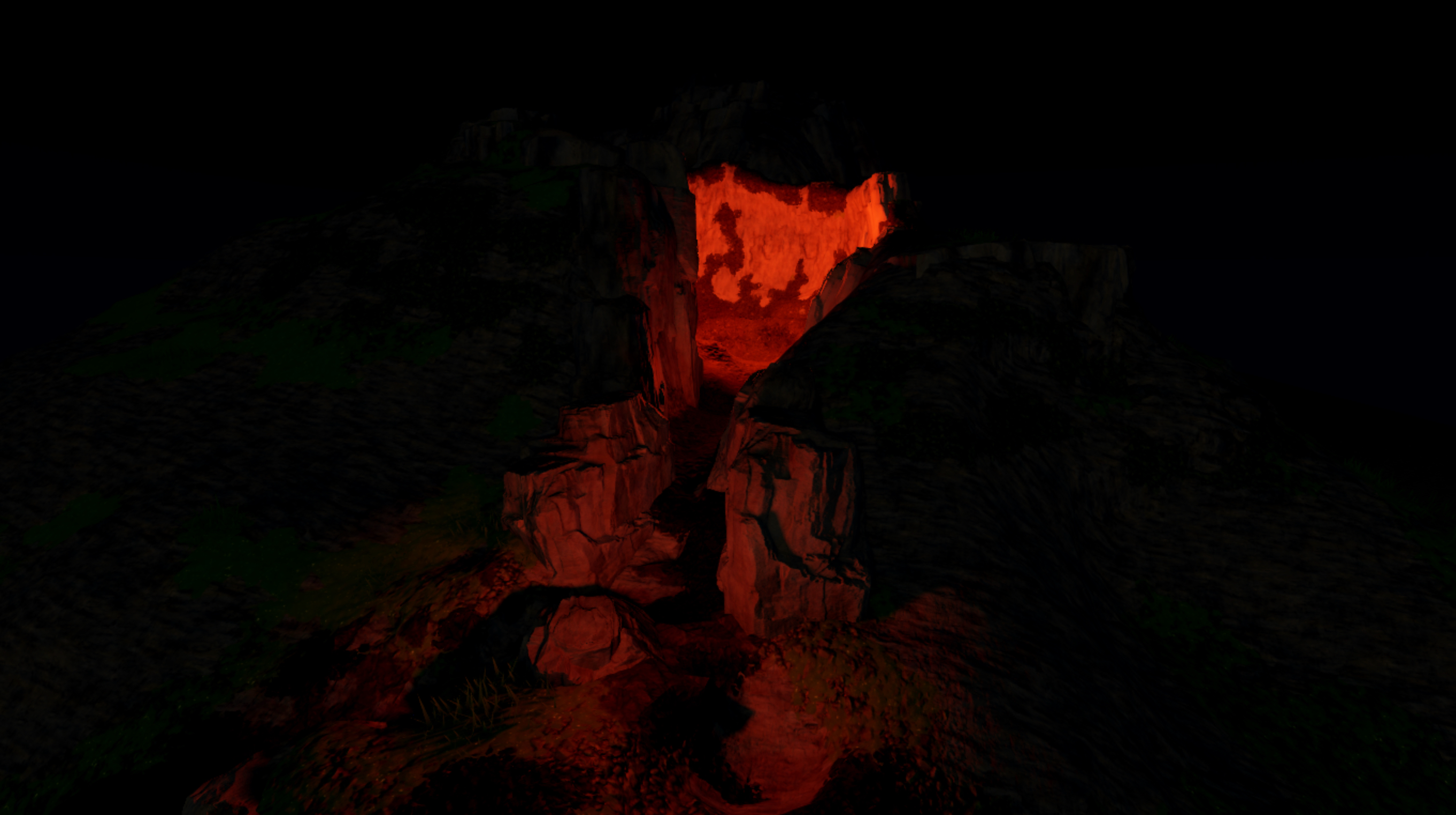 A front view of the volcano with pitch black outdoor lighting and local lighting that glows orange.