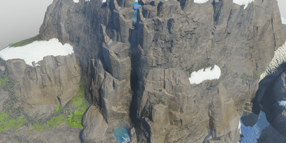 An angled side view of the cliff with two block parts positioned where the fast running cascade texture should render.