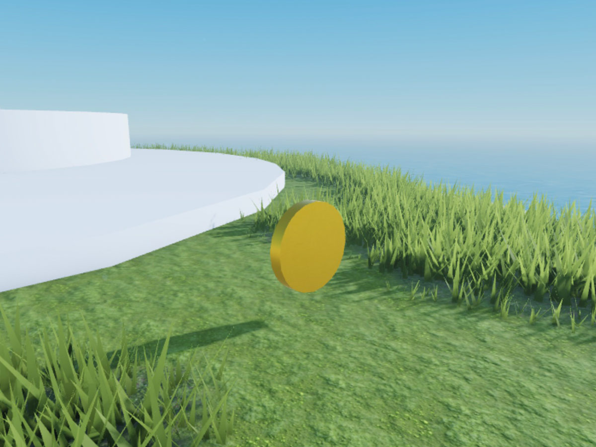 A close up view of a gold coin next to two gray cylinder sea stacks on the island.